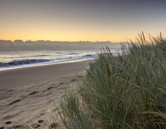 Sun rising over the beach at Sandilands, Lincolnshire