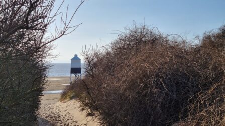 View of The Low Lighthouse at Burnham-on-Sea from one of the link paths between the beach and the road.